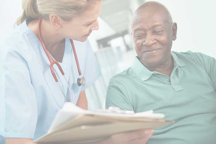 Clinician is reviewing medical information with a patient