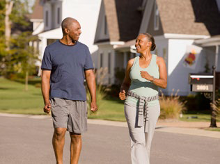 Couple walking together to get active