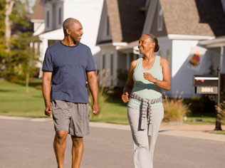 Image: Couple walking together, being active