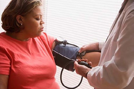 Woman getting a blood pressure reading